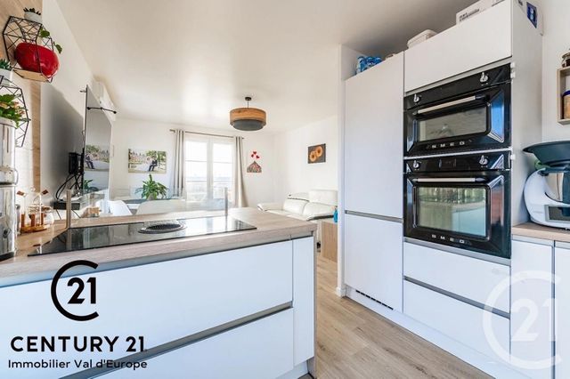 Appartement F4 à louer - 4 pièces - 82.58 m2 - MONTEVRAIN - 77 - ILE-DE-FRANCE - Century 21 Immobilier Val D'Europe